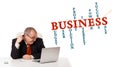 bisinessman sitting at desk and looking laptop with business word cloud Royalty Free Stock Photo