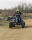 Rider driving in the quad bike race. Royalty Free Stock Photo