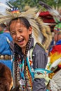 Laughing young dancer of the Pow Wow