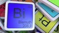 Bismuth Bi block on the pile of periodic table of the chemical elements blocks. 3D rendering Royalty Free Stock Photo