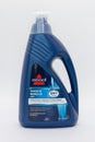 Bissell branded carpet cleaner in recyclable plastic bottle and cap Royalty Free Stock Photo