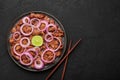 Bistek Tagalog or Bistec Encebollado on black plate on slate table top. Filipino spanish cuisine beef steak with onion Royalty Free Stock Photo