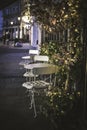 Bistro tables on a pavement outside of a cafe in London, England Royalty Free Stock Photo