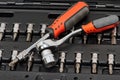 Bit set, screwdriver, wrench in a plastic case Royalty Free Stock Photo