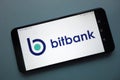 Bitbank cryptocurrency exchange logo displayed on smartphone