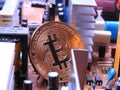 Bitcoin with electronic parts Royalty Free Stock Photo