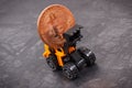 Bitcoin as virtual money and miniature excavator, mining cryptocurrency and international network payment concept Royalty Free Stock Photo