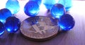 Bitcoin with blue marbles. Royalty Free Stock Photo