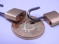 Bitcoin and brass padlocks Royalty Free Stock Photo