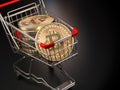 Bitcoin BTC coins in the shopping cart on black background. Cryptocurrency market concept. Royalty Free Stock Photo