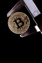 Bitcoin and calibre on black background