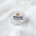 Bitcoin cloud isolated on white background