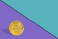 . Bitcoin coin isolated on colored background, hard shadows. E-business prosperity concept