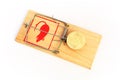 Bitcoin coin in a mousetrap