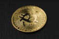 Bitcoin coin on slate background. Close up . Investment, gold