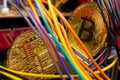 Bitcoin coins, colorful cables and printed circuit board PCB