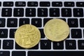 Bitcoin coins on laptop keyboard. Cryptocurrency. Selective focus Royalty Free Stock Photo