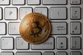 Bitcoin on computer keyboard. top view Royalty Free Stock Photo