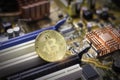 Bitcoin on the computer motherboard Royalty Free Stock Photo