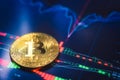 Bitcoin. Crypto currency Bitcoin, BTC, Bit Coin. Bitcoin golden coins on a chart. Blockchain technology, bitcoin mining concept