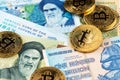 Bitcoin Cryptocurrency Coins on Iran Rial and Zimbabwe hyperinflation Dollar banknotes.