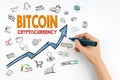 Bitcoin Cryptocurrency Concept. Hand with marker writing Royalty Free Stock Photo