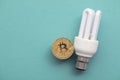 Bitcoin cryptocurrency eco sustainability concept. coin with light bulb Royalty Free Stock Photo
