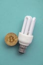 Bitcoin cryptocurrency eco sustainability concept. coin with light bulb Royalty Free Stock Photo