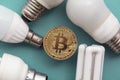 Bitcoin cryptocurrency eco sustainability concept. coin with light bulb Royalty Free Stock Photo