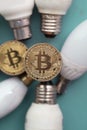 Bitcoin cryptocurrency eco sustainability concept. coin with light bulb Royalty Free Stock Photo