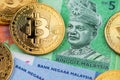 Bitcoin Cryptocurrency and Malaysia Ringgit currency. Royalty Free Stock Photo