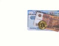 Bitcoin cryptocurrency with money in Russian rubles on a white background Royalty Free Stock Photo