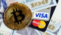 bitcoin cryptocurrency and Visa, MasterCard cards with money Royalty Free Stock Photo