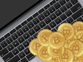 Close up of Golden Bitcoin on laptop background. Symbol of digital money coin. Virtual cryptocurrency, future business concept Royalty Free Stock Photo