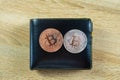 Bitcoin digital currency instead real money, bit-coin with leather wallet or purse on wooden working table, virtual Royalty Free Stock Photo