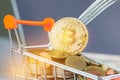 Bitcoin Digital Virtual money on Coins shopping cart with Hard Fork. Concept of Blockchain Transaction System Crisis , Bitcoin Royalty Free Stock Photo