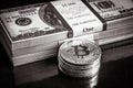 Bitcoin with dollar cash stacks, digital virtual crypto currency bitcoin and paper money pile