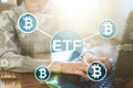 Bitcoin ETF, Exchange traded fund and cryptocurrencies concept on virtual screen.