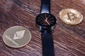 Bitcoin and Ethereum on a dark wooden surface