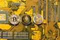 Bitcoin, Ethereum, Ripple coins on computer motherboard, cryptocurrency investing concept Royalty Free Stock Photo