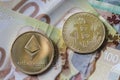 Bitcoin and Etherium Token on Cash Royalty Free Stock Photo
