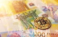 Bitcoin on euro banknotes. Bitcoin price plummeting concept. 3D Rendering Royalty Free Stock Photo