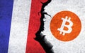 Bitcoin and France flag on a wall with a crack.