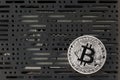 Bitcoin in front of computer board Royalty Free Stock Photo