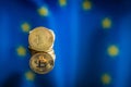 Bitcoin in front of Europe union flag. Digital cryptocurrency