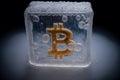 Bitcoin frozen inside ice cube, Bitcoin price crisis concept. Neural network generated art Royalty Free Stock Photo