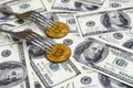 Bitcoin getting New Hard Fork Change, Physical Golden Crytocurrency Coin under the fork on the dollars background. Blockchain Tra