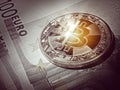 Bitcoin glowing over euro banknotes. crypto currency concept Royalty Free Stock Photo