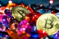 Bitcoin Gold coins strewn with various stones. Golden bitcoin cryptocurrency mining concept