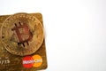 Bitcoin and MasterCard Royalty Free Stock Photo